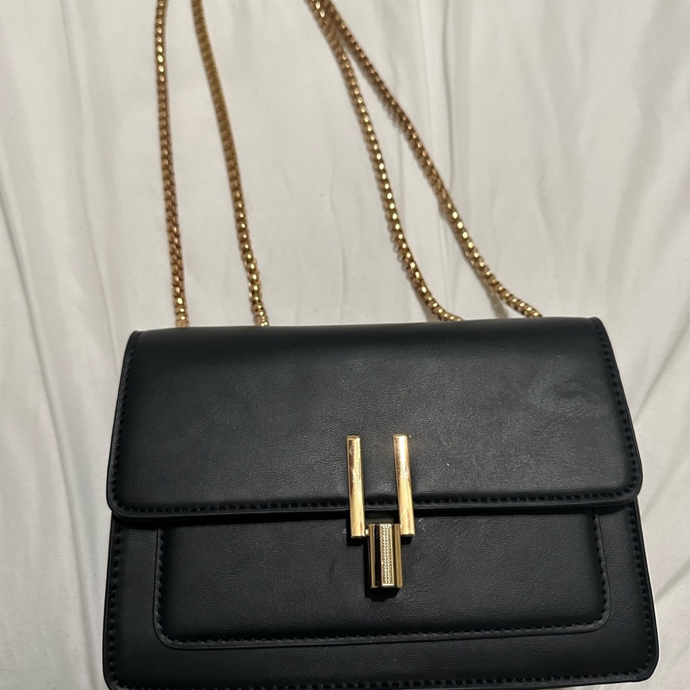 Black convertible purse. Crossbody or shoulder bag